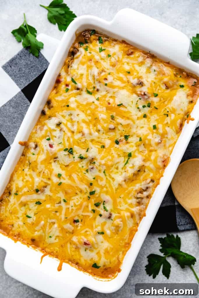 Cheesy Hamburger Rice Casserole Recipe for Comforting Weeknight Meals 10 Melted cheese over a rice and ground beef casserole.