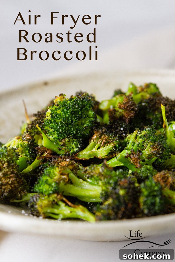 Crispy Air Fryer Roasted Broccoli Recipe 2 Air Fryer Roasted Broccoli in a white bowl
