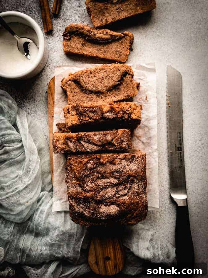 Gluten-Free, Dairy-Free Breakfast Cookies — Make-Ahead Recipe 6 cinnamon swirl bread on a cutting board with a knife next to it