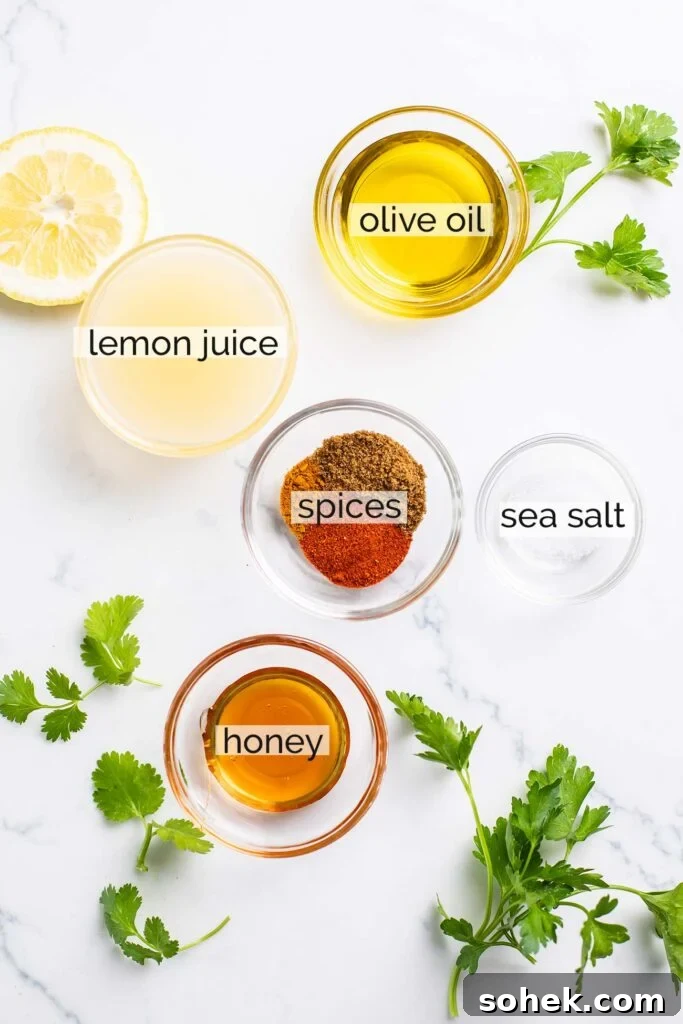 Ingredients in a lemon vinaigrette shown with labels.