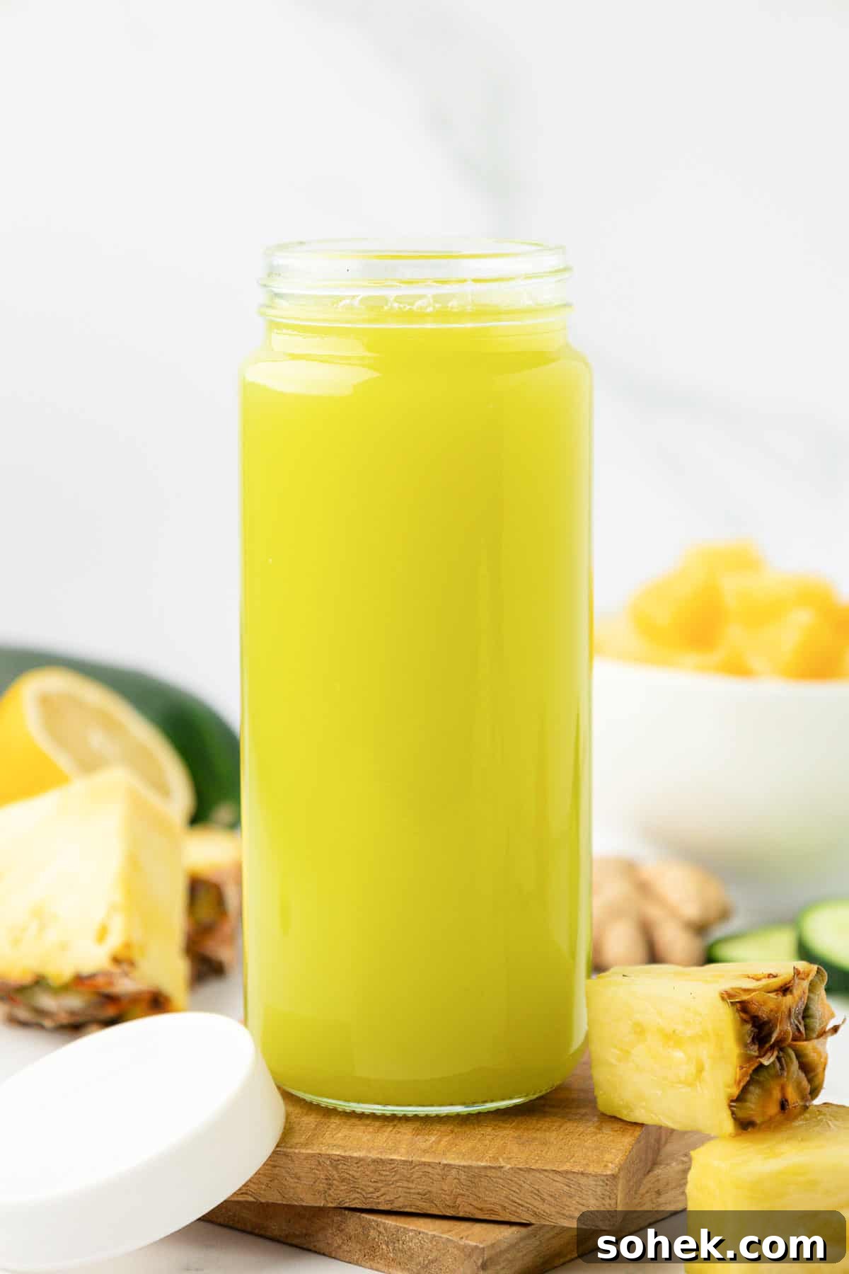 pineapple cucumber juice in a glass with a lid for storage
