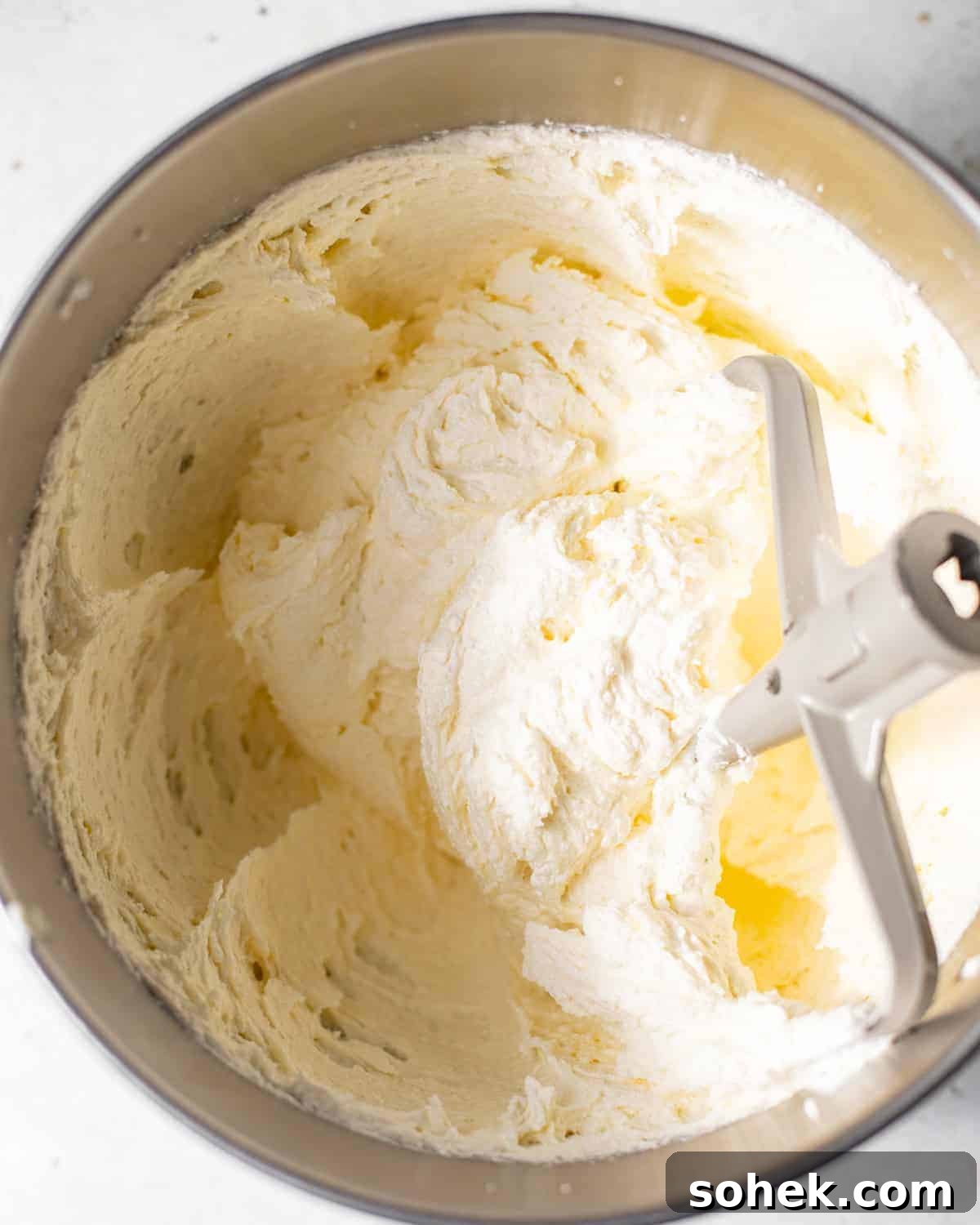 butter, sugar, oil, and key lime zest creamed together in the bowl of a stand mixer with the paddle attachment.