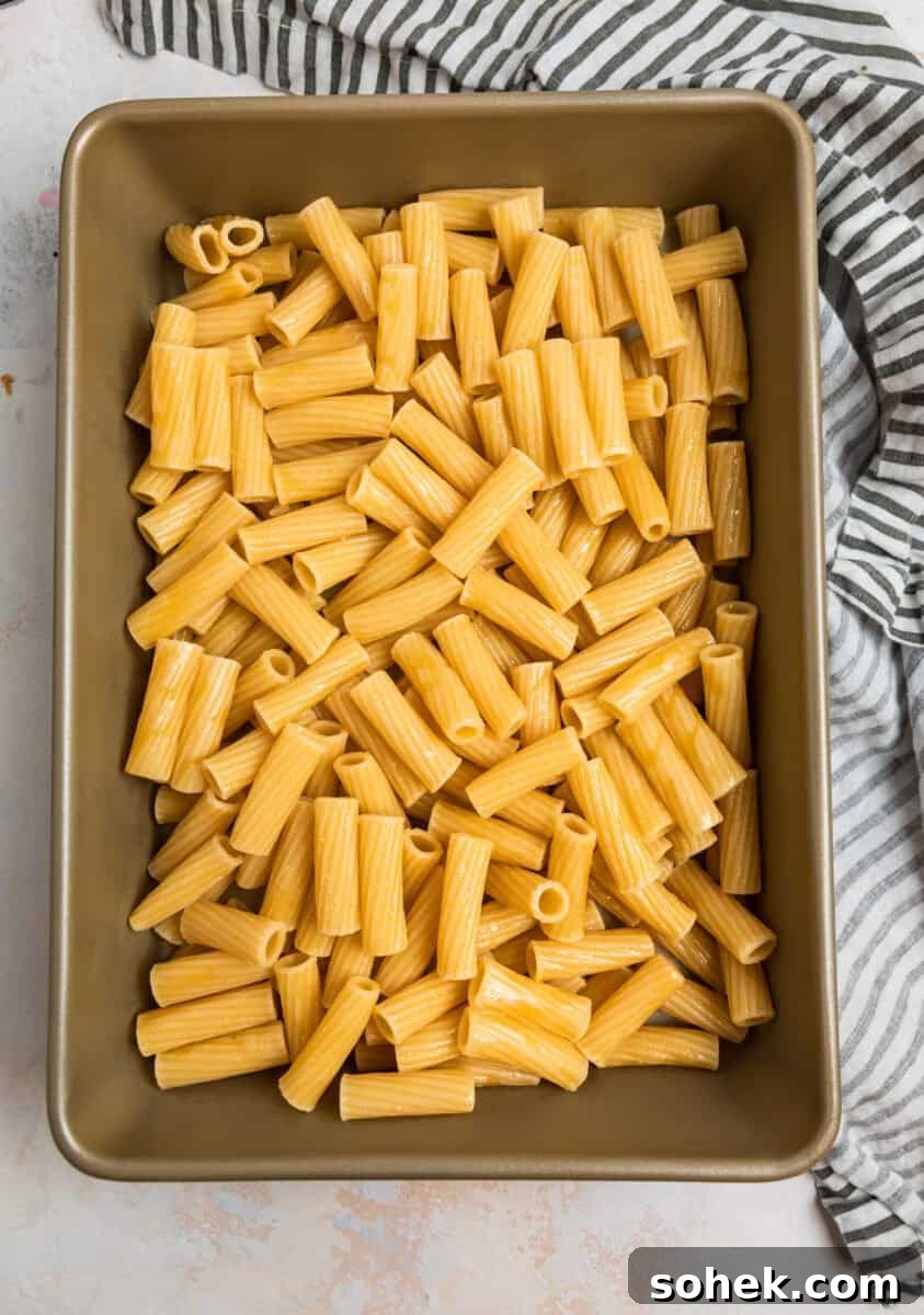 Spinach and Artichoke Chicken Casserole Recipe for Family Meals 6 Pasta in 9x13 inch pan.