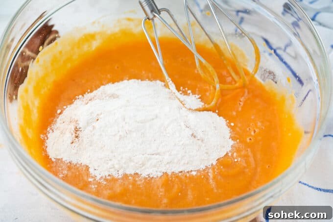 Creamy Sweet Potato Pie Cupcakes Recipe for Fall Desserts 7 Making batter for sweet potato pie cupcakes.