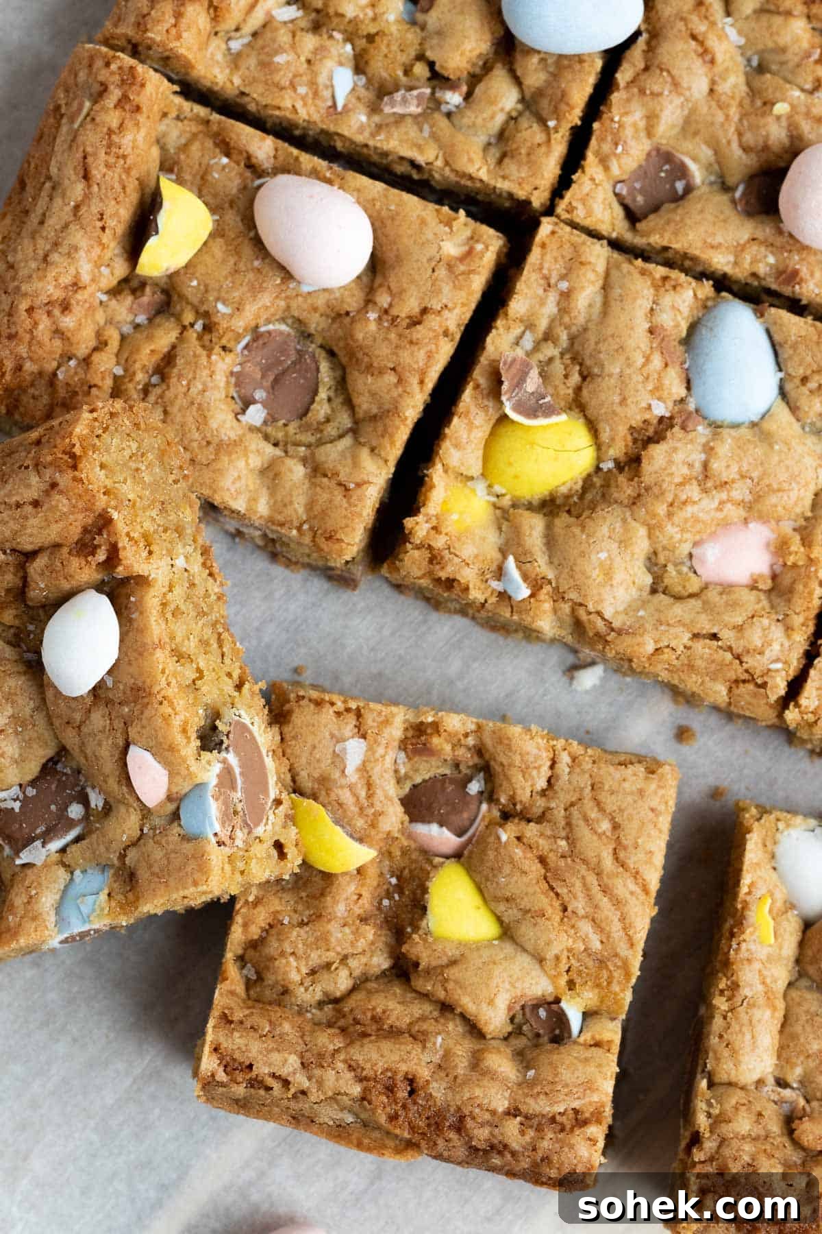 Mini Egg Cookie Bars Recipe — Chewy Springtime Treat 3 close up of mini egg cookie bars cut into squares