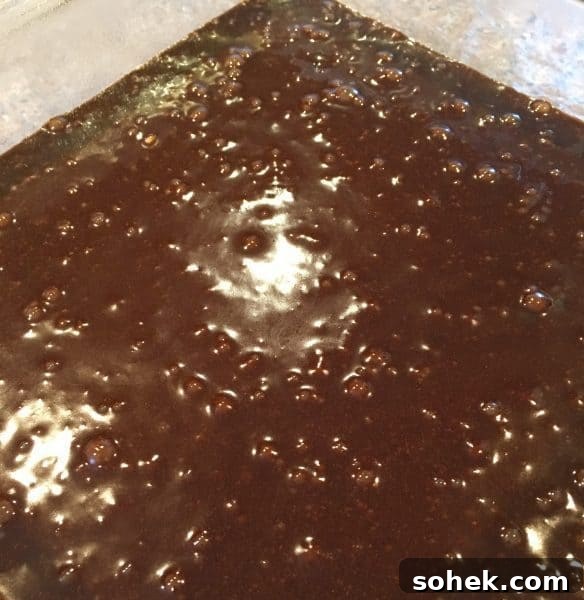 Ultimate Kicked-Up Boxed Brownies Recipe (Fast & Fudgy) 5 8 x 8 baking dish sprayed and filled with brownie batter