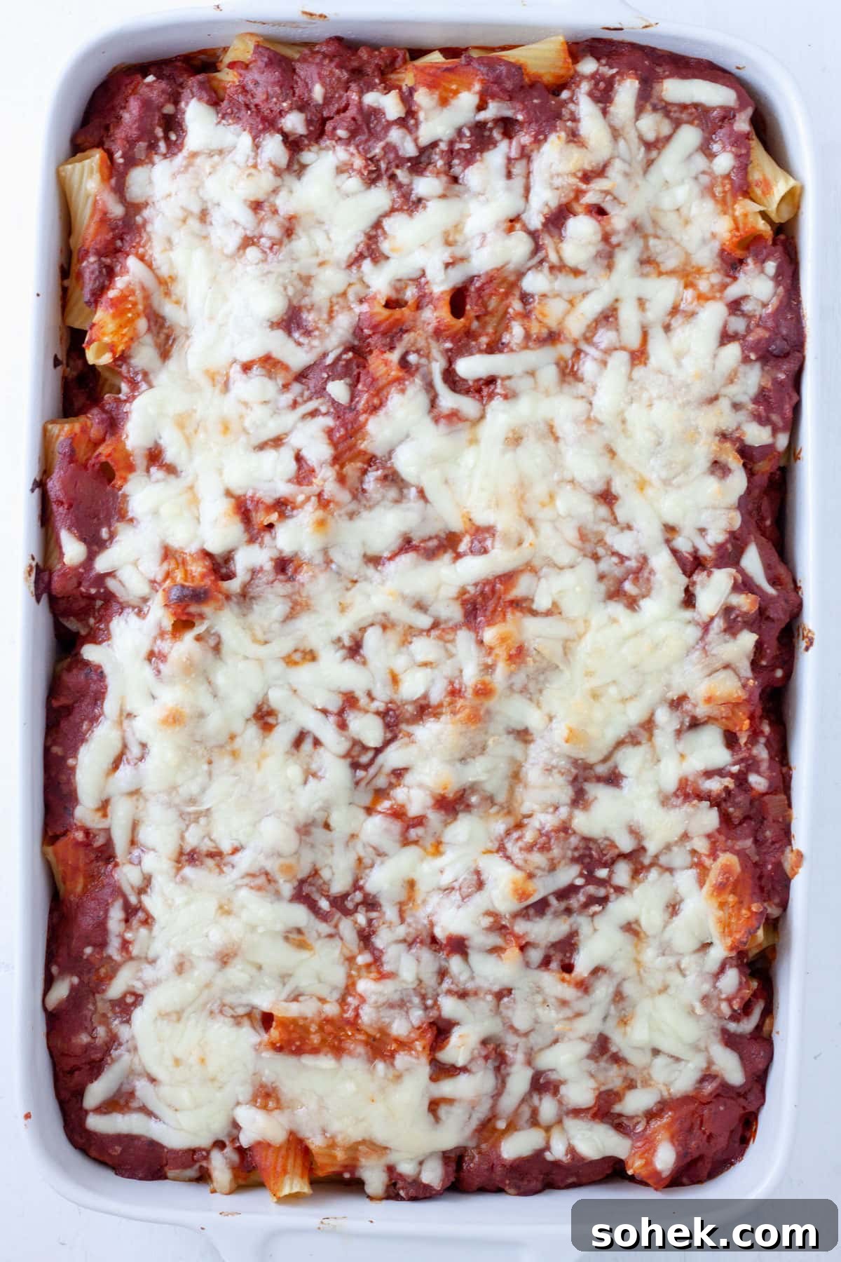 Rigatoni al forno baked and bubbly with melty cheese on top.