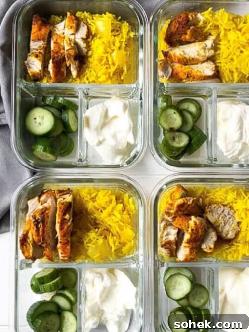 bowls of turmeric rice with turmeric chicken