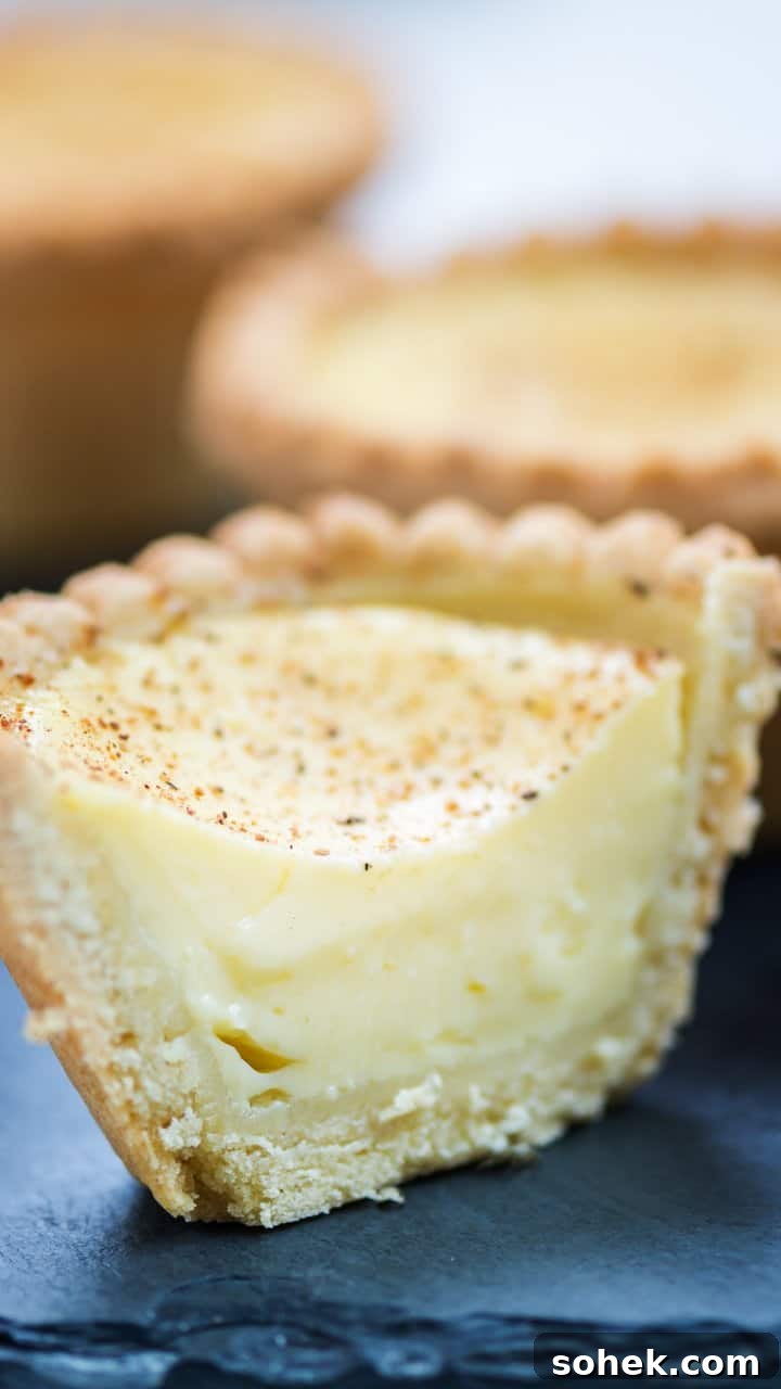Gluten Free Egg Custard Tart with a lovely home made gluten free shortcrust pastry and a very silky smooth filling. Serve warm or chilled.