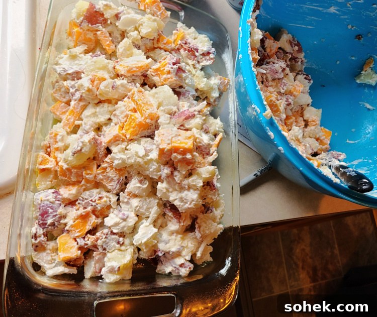 Smoked Cheesy Potatoes in casserole dish