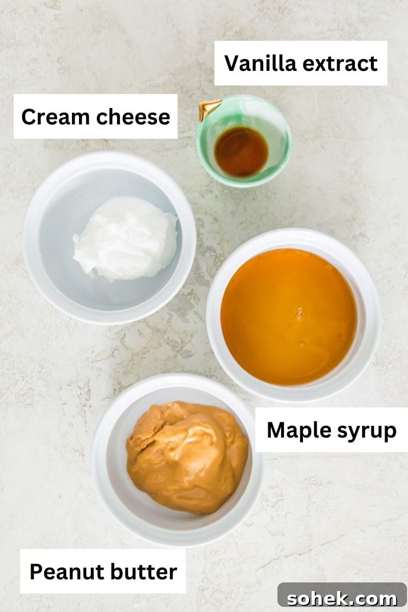 Peanut Butter Mousse with 4 Ingredients — Quick Creamy Dessert 3 Four small bowls filled with vanilla extract, cream cheese, maple syrup and peanut butter.