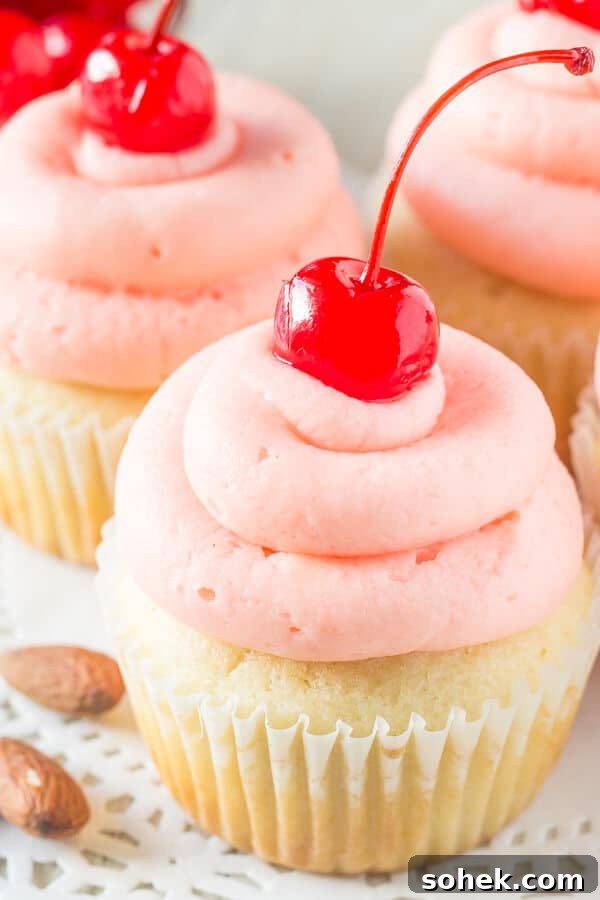 Cherry Almond Cupcakes with Cherry Glaze and Almond Crumble 2 Cherry Almond Cupcakes. Fluffy, moist, super soft almond cupcakes topped with maraschino cherry frosting. www.justsotasty.com