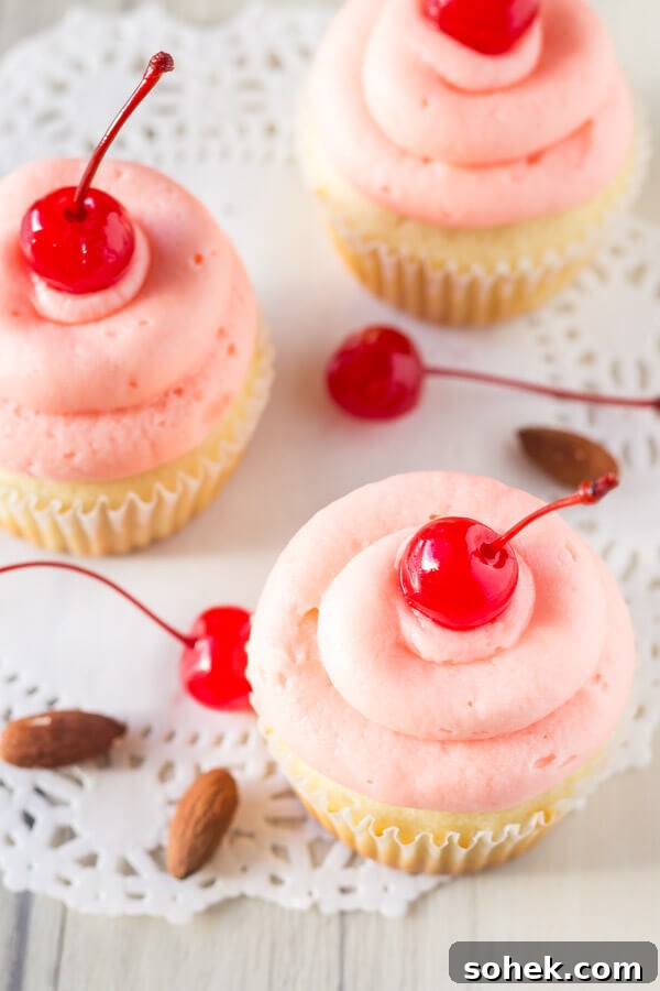 Cherry Almond Cupcakes with Cherry Glaze and Almond Crumble 3 Cherry Almond Cupcakes. Fluffy, moist, super soft almond cupcakes topped with maraschino cherry frosting. www.justsotasty.com