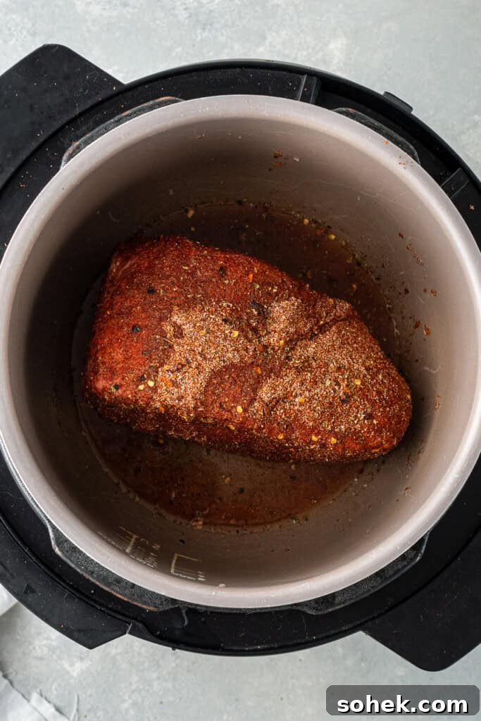Beef roast in a slow cooker.