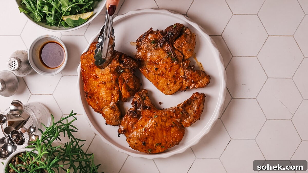 Crispy Tender Pork Chops in the Air Fryer Every Time 9 pork chop in plate