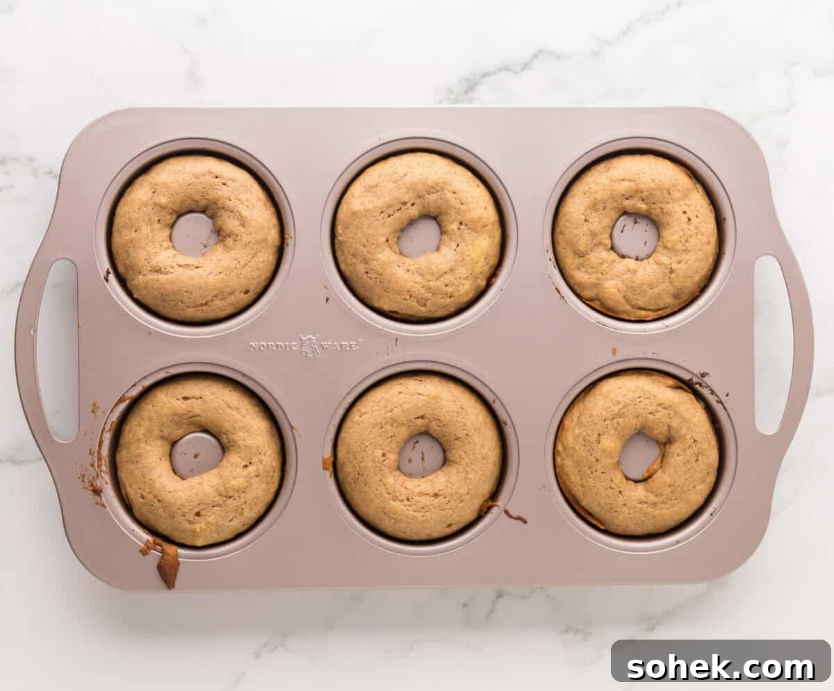 Maple-Glazed Donuts: Homemade Recipe and Serving Tips 10 cooked maple donuts in donut mold