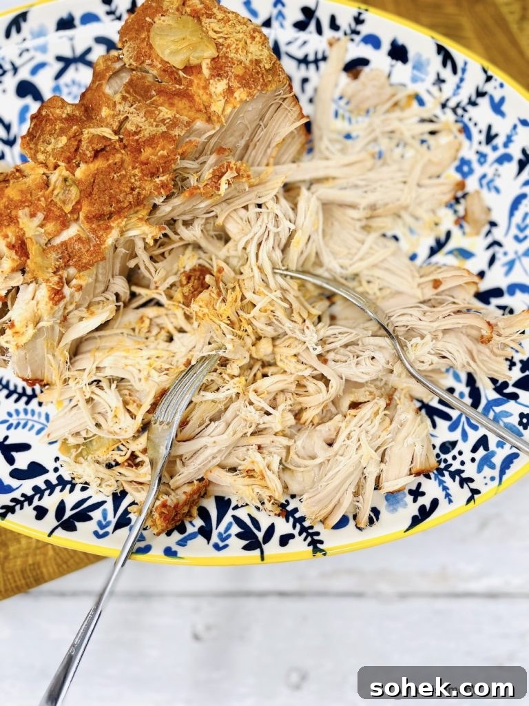 Smoky Pulled Pork for Bonfire Night Recipes 6 Platter of smoky pulled pork meat shredded with forks