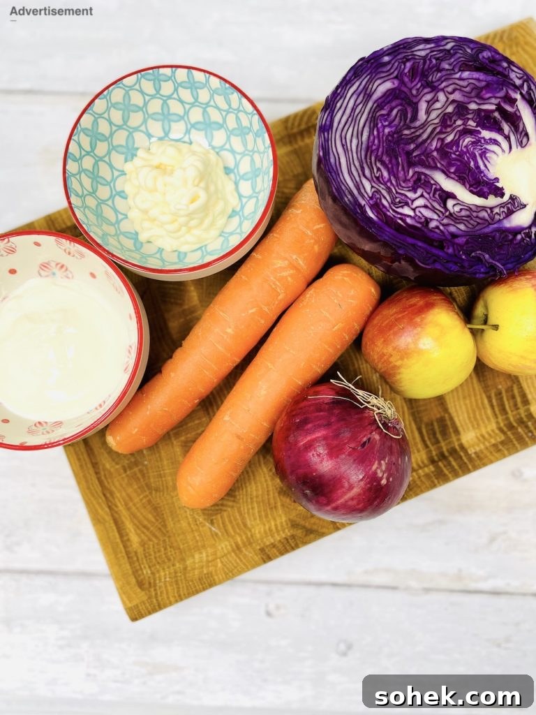 Smoky Pulled Pork for Bonfire Night Recipes 3 Homemade coleslaw ingredients - carrots, red cabbage, red onion, apples, yogurt and mayonnaise
