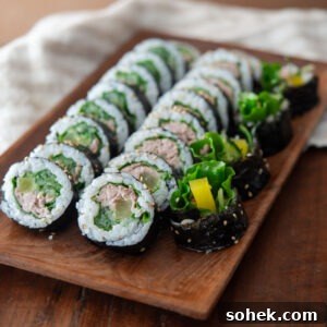 Tuna kimbap slices on a serving platter.