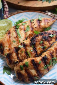 Chicken tenders on a plate.