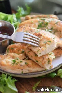 Close up of chicken tenders on a plate.