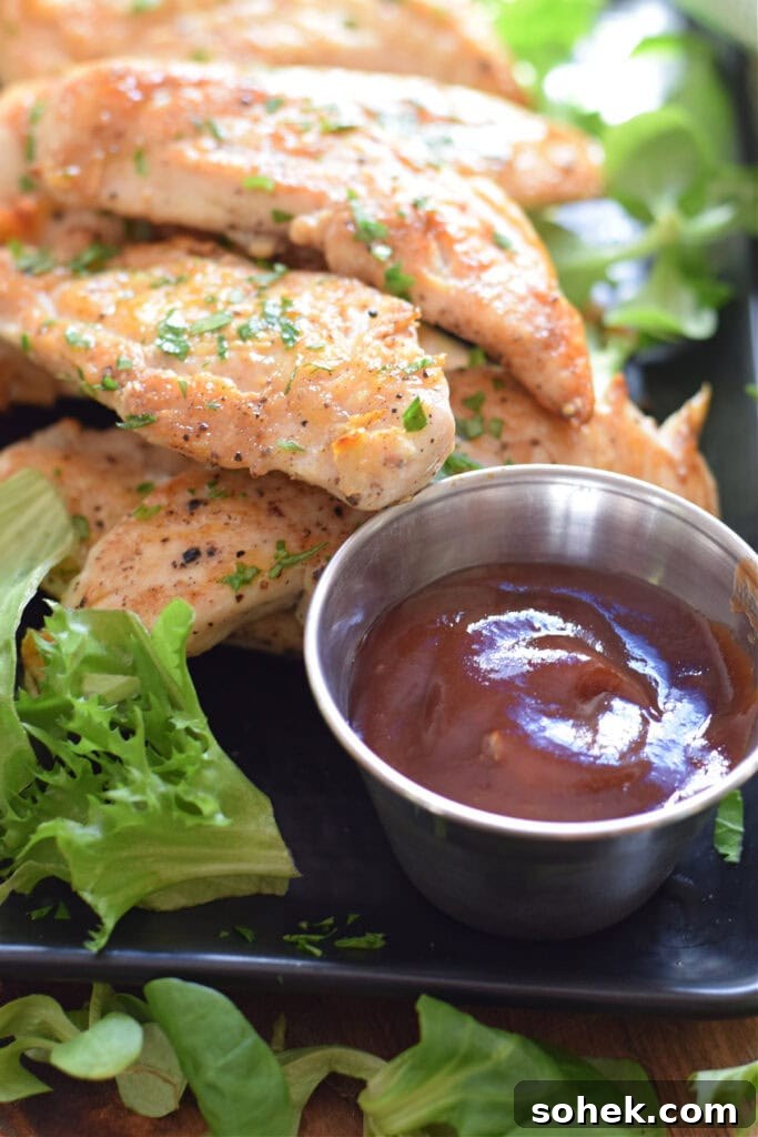 Chicken tenders with dipping sauce.