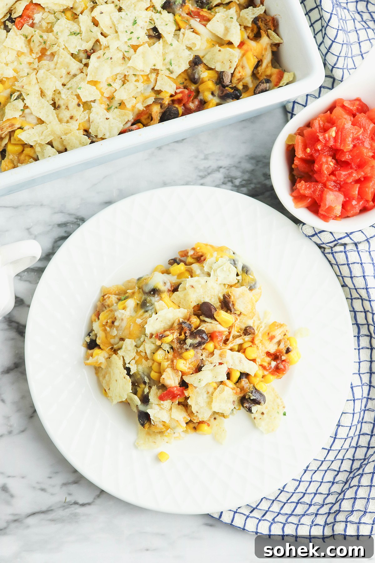 Serving of Mexican Chicken Casserole on white plate.