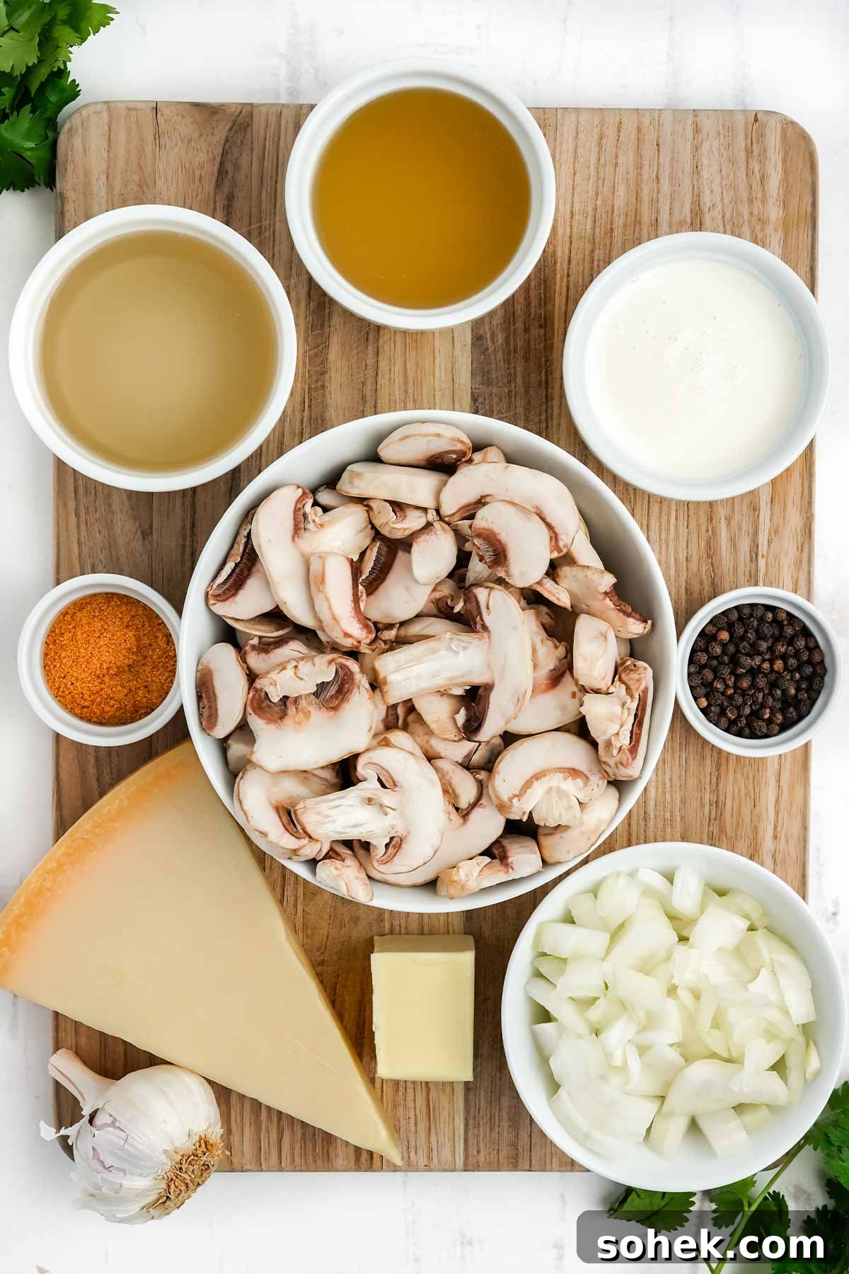 Ingredients to make white wine mushroom sauce with cream.