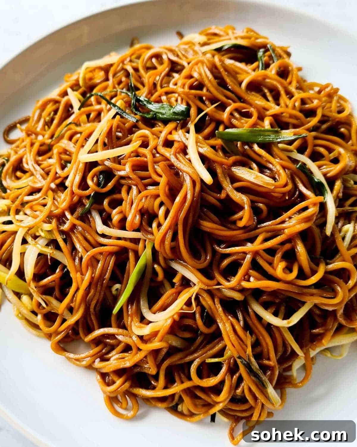Close up of a large plate of cooked egg noodles
