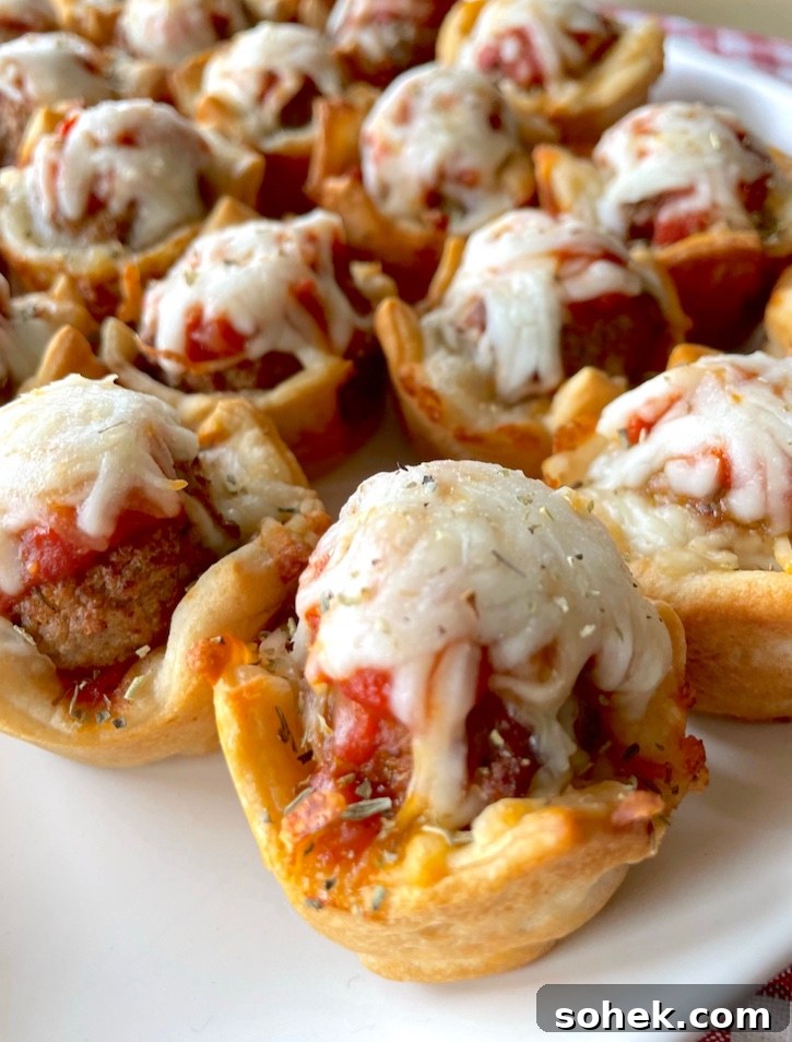Savory Mini Meatball Cupcakes for Appetizers and Parties 11 Yummy dinner idea for a family with kids! These mini meatball cupcakes are fun to make in a mini muffin tin with just a few budget friendly ingredients: Pillsbury dough, frozen meatballs, cheese, and pizza sauce! They make for a wonderful quick meal as well as a filling snack for afters school. Great for sleepovers!