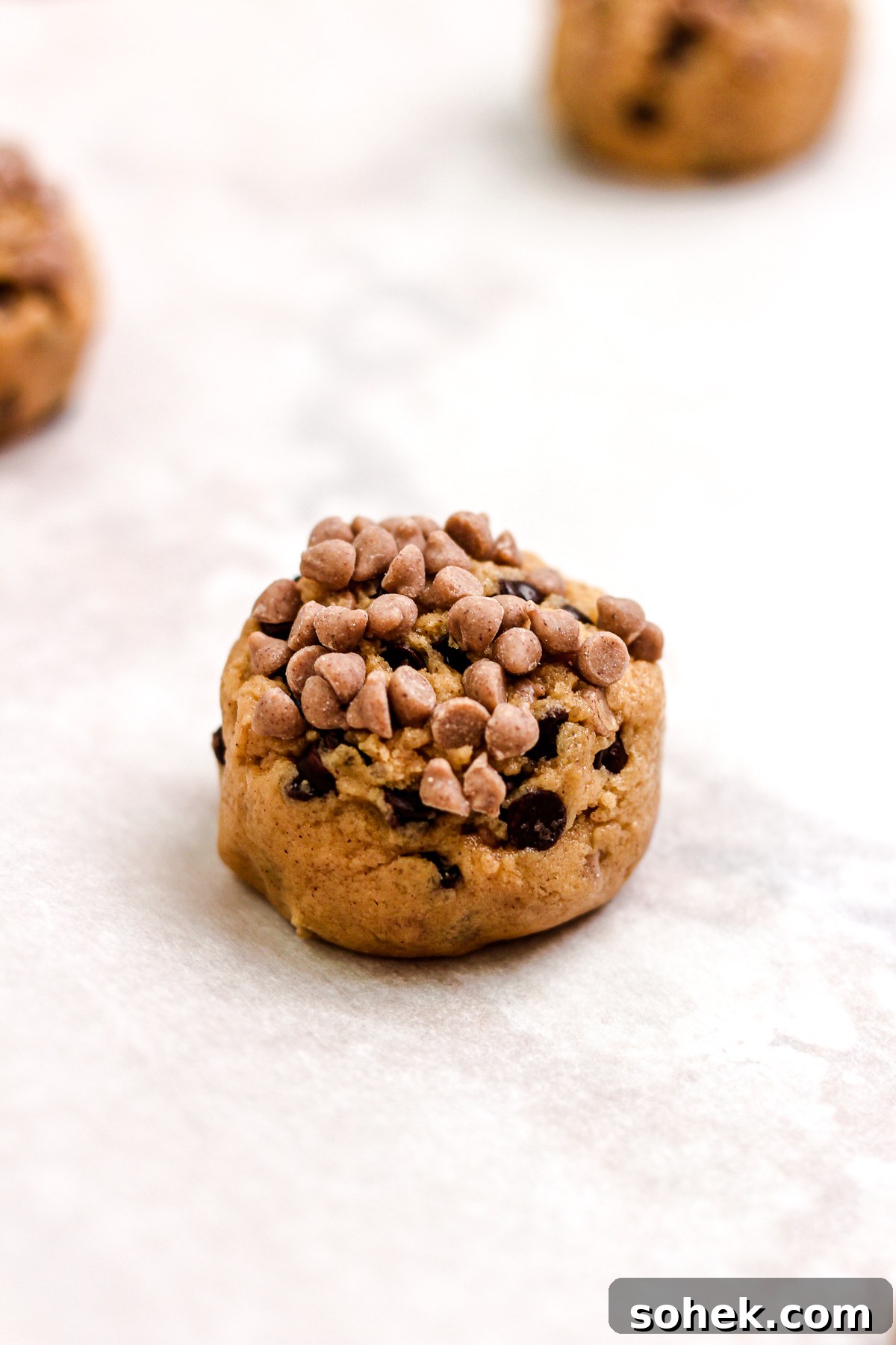 Cinnamon Chocolate Chip Cookie Recipe — Warm, Spiced Chocolate Treat 11 Cinnamon chocolate chip cookie dough ball and mini cinnamon chips.