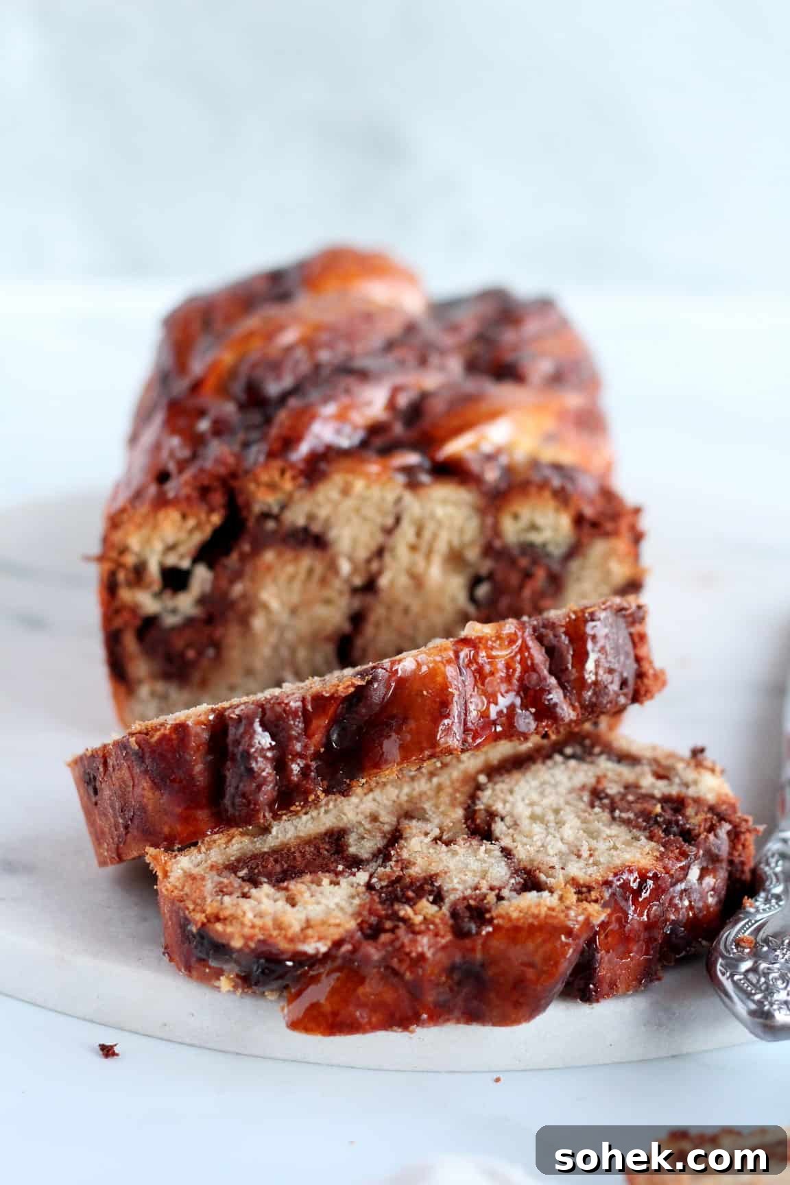 chocolate babka with almond filling cut in pieces