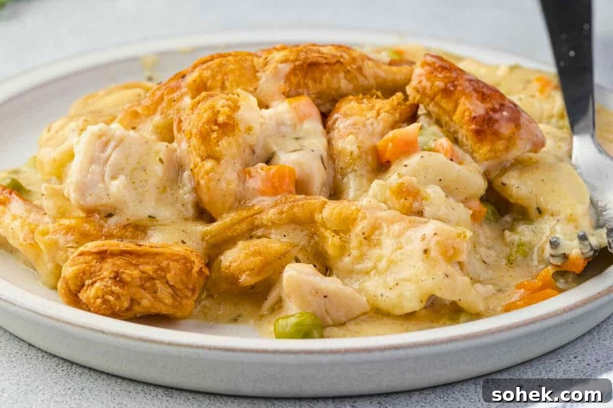 Turkey pot pie topped with flaky puff pastry.
