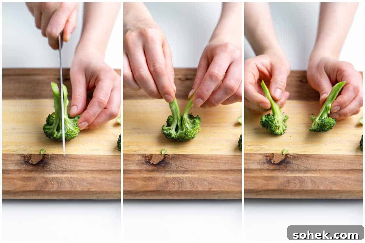 Broccoli florets are being cut into smaller sizes.