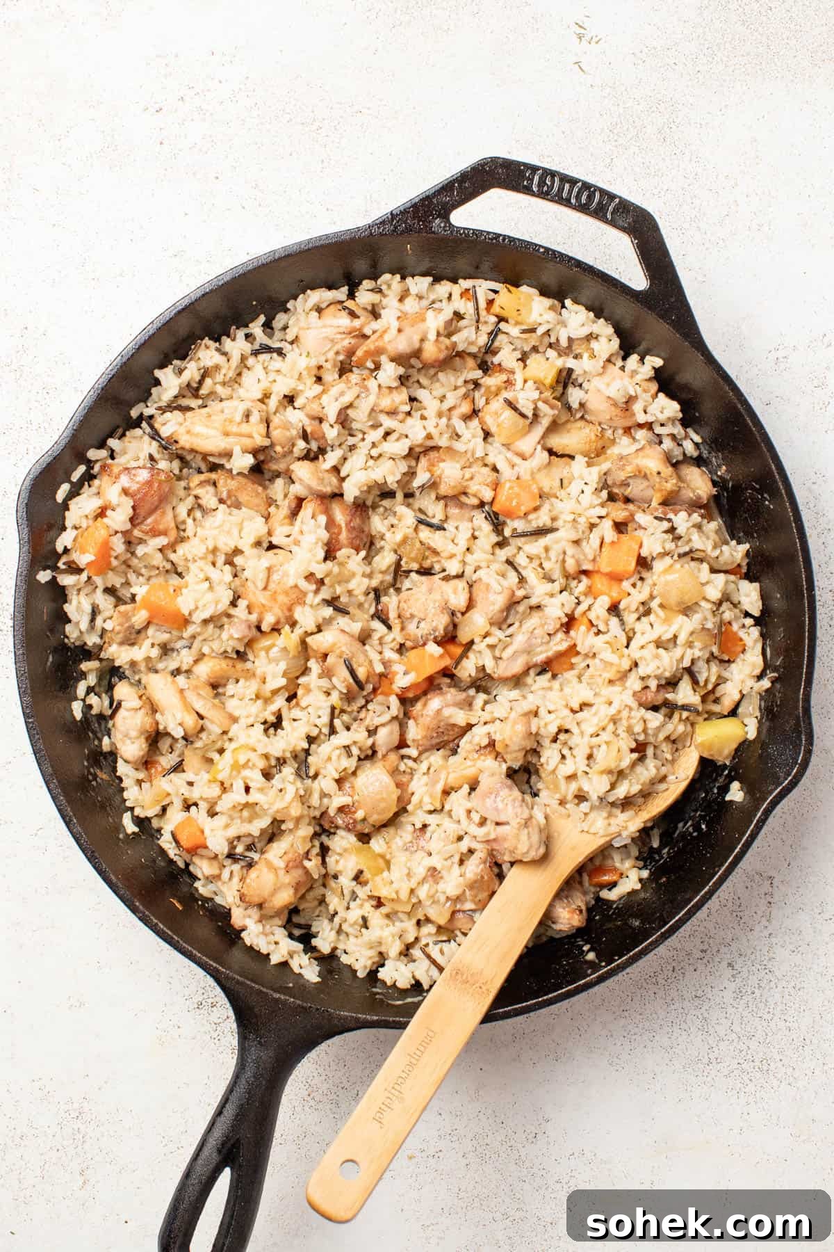 Dijon Chicken Skillet with Wild Rice and Veggies 8 Stirring the wild rice into the chicken and dijon sauce.