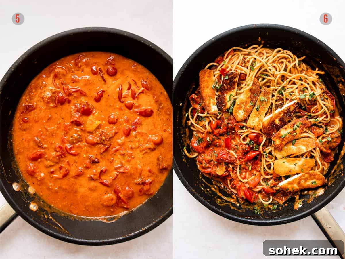 Halloumi pasta with tomato sauce and herbs.