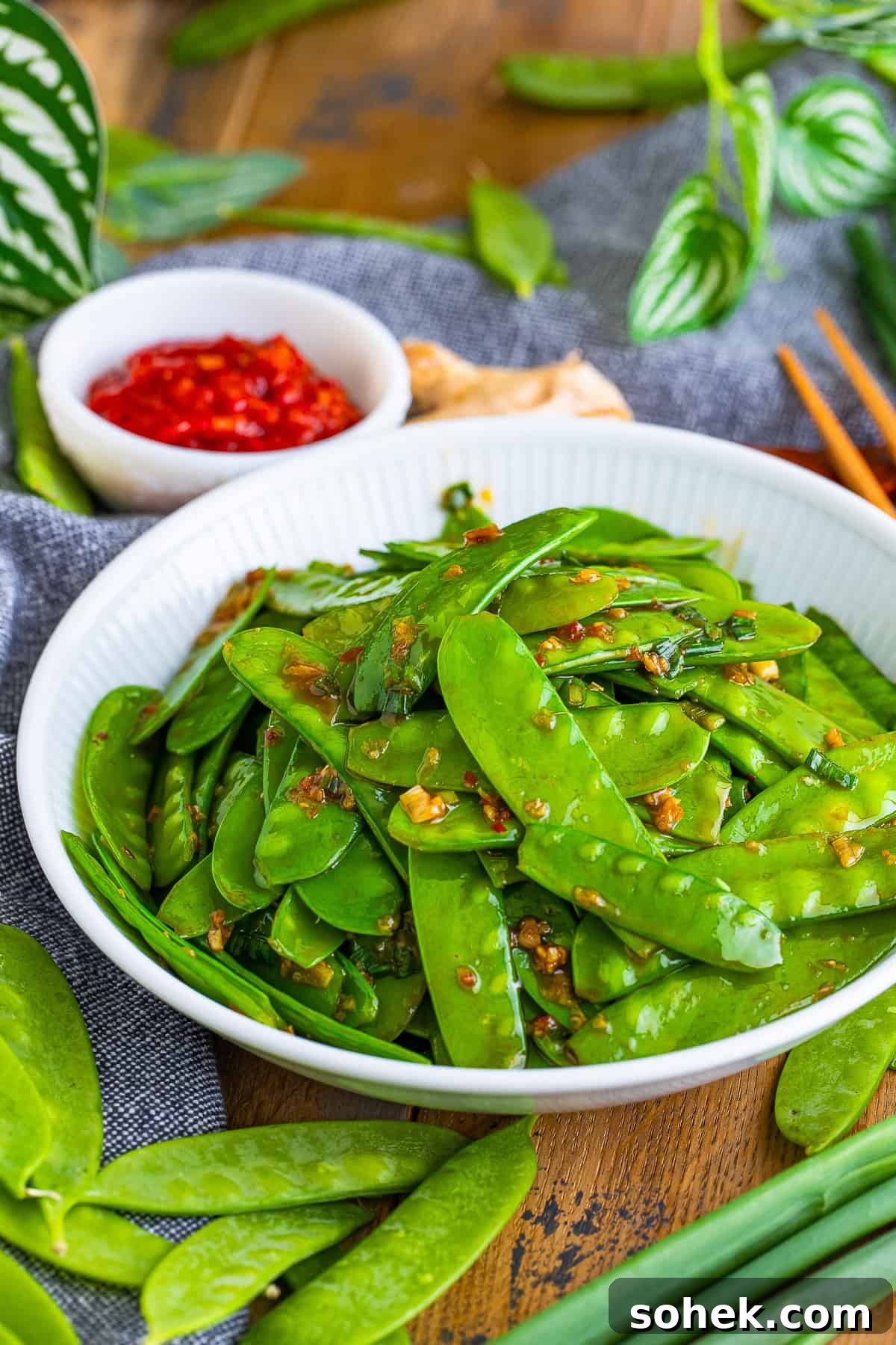snow peas recipe served in a white bowl