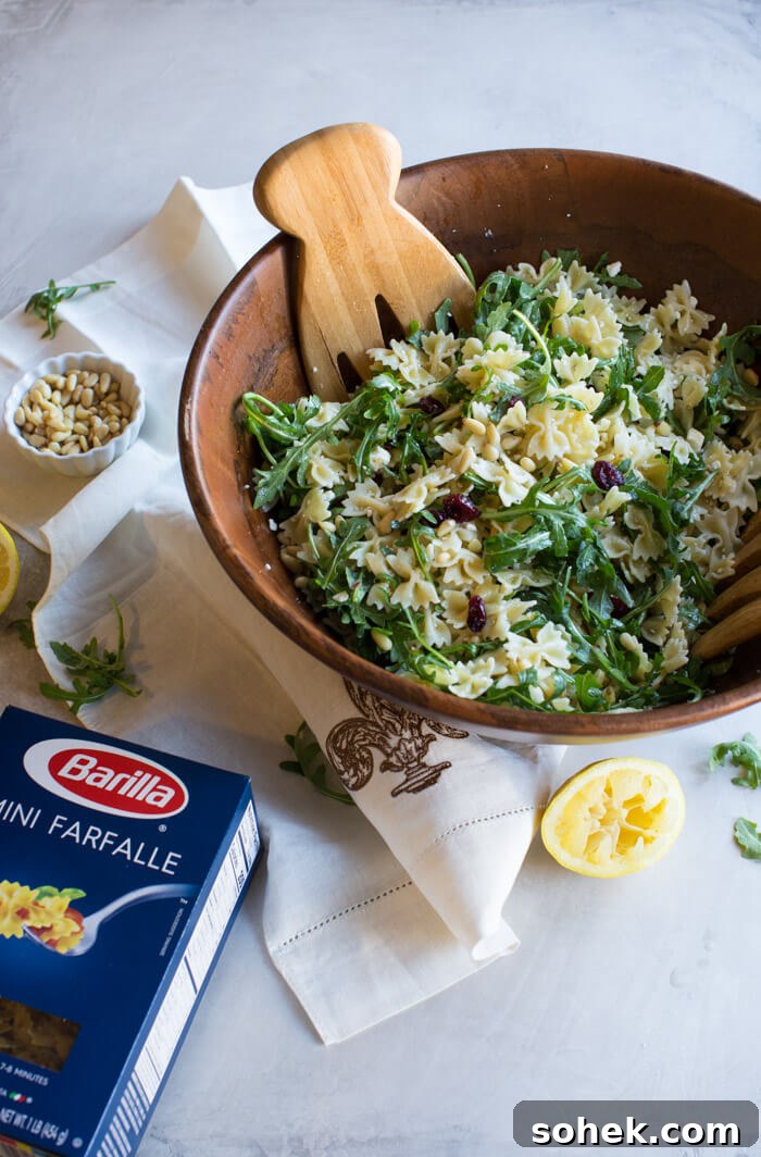 Lemon Arugula Pasta Salad Recipe for Bright Summer Meals 2 Lemon Arugula Pasta Salad. This is what it looks like to live your best springy pasta life. Easy to make ahead for baby or wedding shower!
