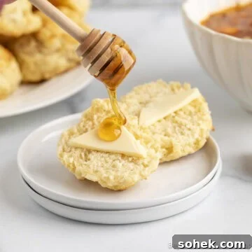 Easy drop biscuits with butter and a honey drizzle.