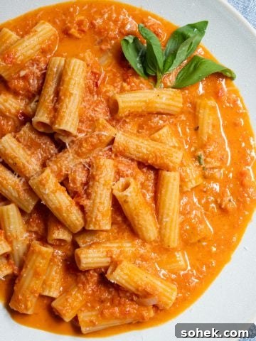 creamy red pepper sauce over rigatoni