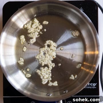 Garlic sauteing in olive oil.
