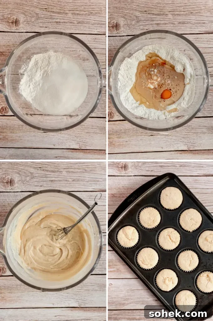 Gluten-Free Dairy-Free Peach Cupcakes: Moist Summer Dessert 4 Soft vanilla cupcakes filled with a peachy pink peach filling and topped with a fluffy light pink peach buttercream frosting swirl.