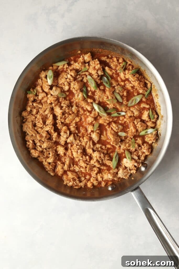 Spicy Firecracker Ground Chicken Recipe for Weeknight Meals 5 buffalo ground chicken in skillet