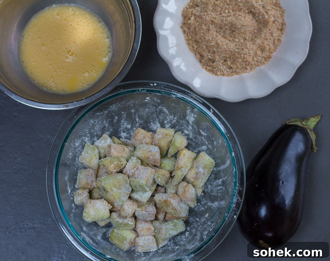 Deconstructed Eggplant Parmesan Salad: Crisp Layers of Flavor 4 Egg-wash and breadcrumbs with eggplant cubes