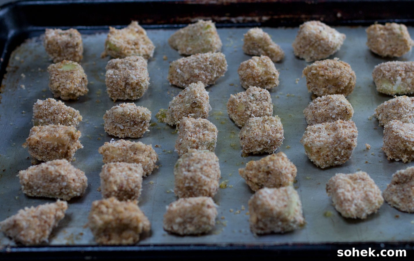 Deconstructed Eggplant Parmesan Salad: Crisp Layers of Flavor 5 Coated eggplant cubes ready to roast