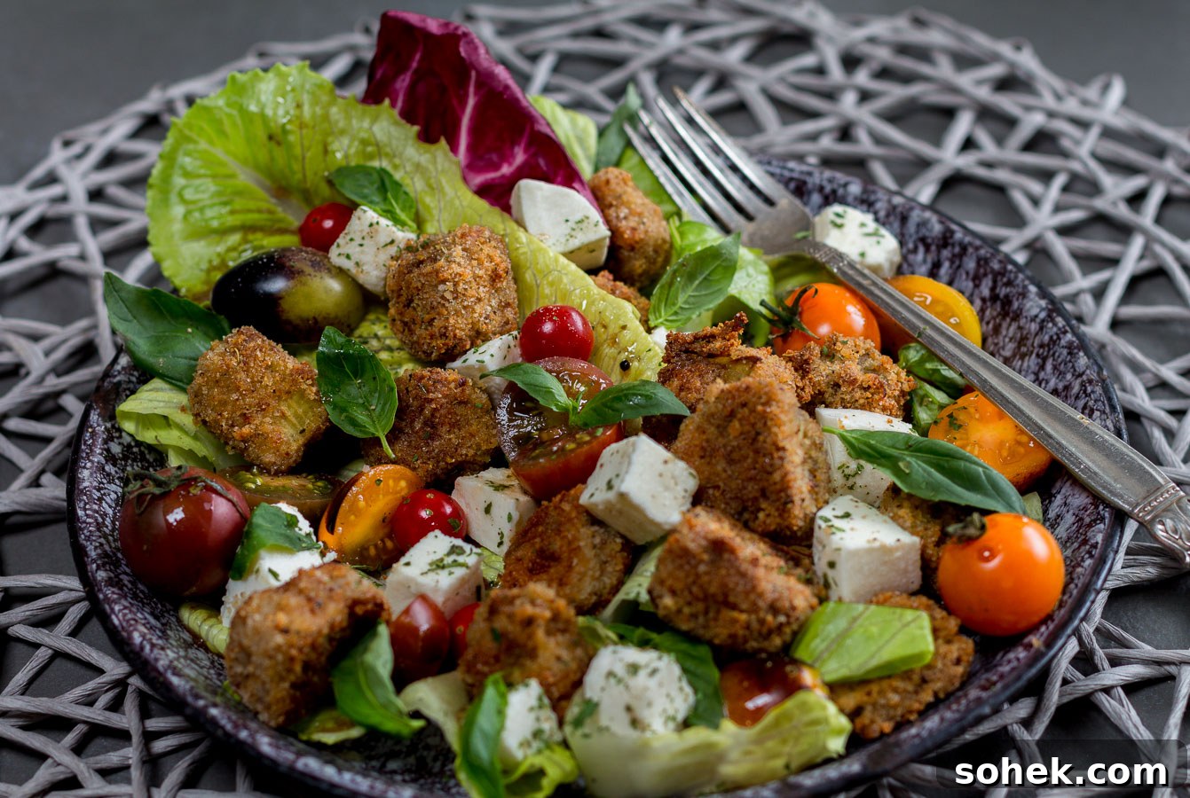 Deconstructed Eggplant Parmesan Salad: Crisp Layers of Flavor 7 Salad tossed with dressing and torn basil