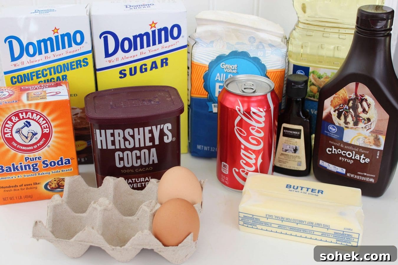 Copycat Cracker Barrel Coca-Cola Cake Recipe You’ll Love 3 ingredients like cocoa powder, eggs, butter, sugar, and coca cola.