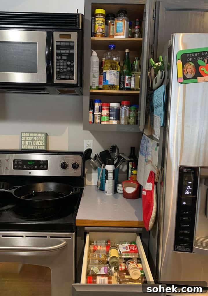 Organize Your Spice Cabinet or Drawer: Smart Tips and Layouts 3 Spice cabinet before photo