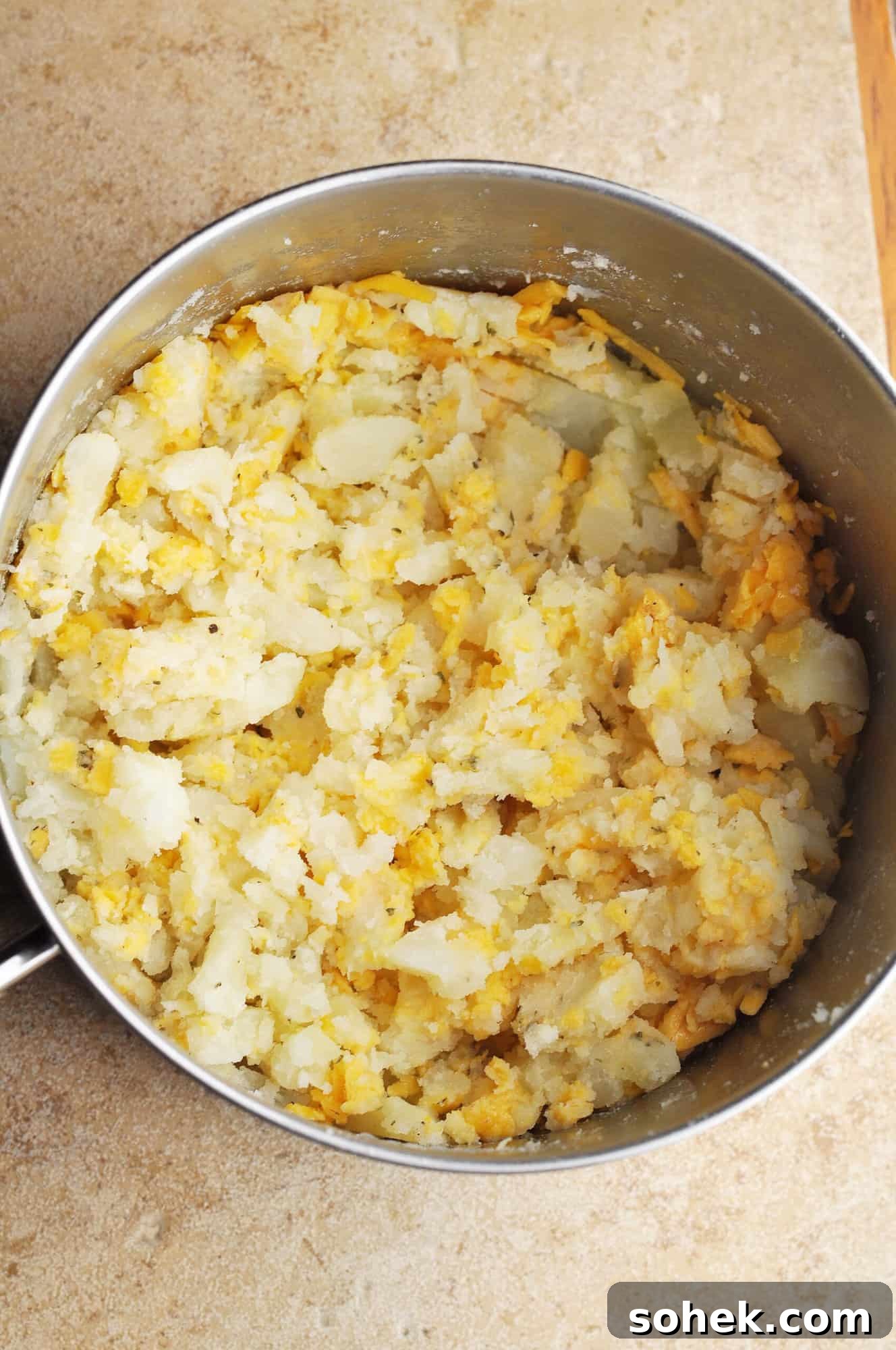 Mashed potatoes and cheese melting