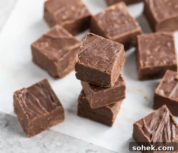 overhead photo of a stack of fudge with more fudge squares around it